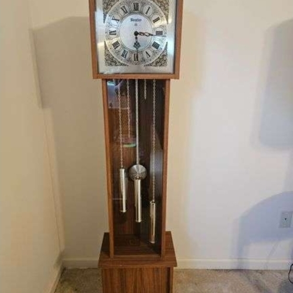 Brown Grandfather Clock with Gold Accents